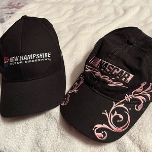 Two NASCAR hats one looks like a woman’s it has pink writing the other is NHMS.